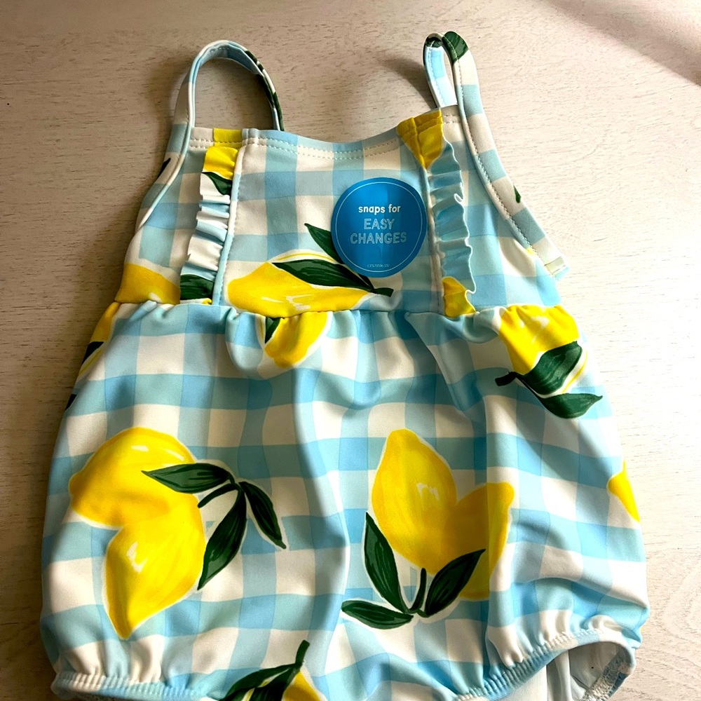 Carters baby girl swim suit. New!